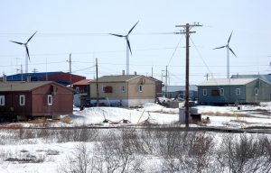 photo of wind turbines in a town