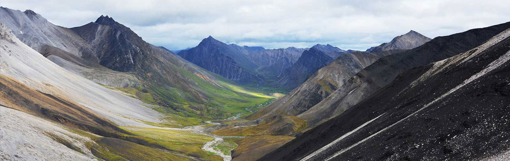 Photo of hikers in the Arctic